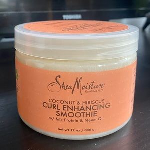 Shea Moisture coconut & hibiscus curl enhancing cream.